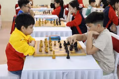 Players take part in a match after the opening ceremony (Photo: VNA)
