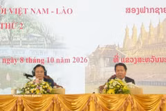 Vietnamese Deputy Minister of Foreign Affairs Ngo Le Van and his Lao counterpart Anouparb Vongnorke co-chair the conference. (Photo: VNA)