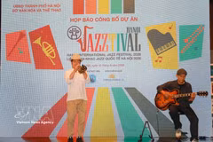 Artists perform at the festival's press conference on August 12. (Photo: VNA)