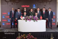 The Viettel Military Industry and Telecoms Group signed a cooperation agreement with Unicom of Singapore on February 4, 2026 (Photo: VNA) 