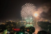 Colourful fireworks light up the area around Hoan Kiem Lake to welcome the 2026 New Year.