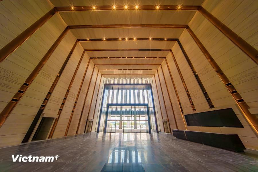 The walls inside the museum’s main hall are inscribed with information about historical milestones. (Photo: VietnamPlus)
