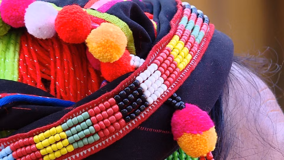 Vibrant patterns on the headdress of a Ha Nhi ethnic woman’s costume. (Photo: VNA)