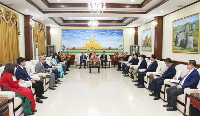 Vietnamese Ambassador to Laos Nguyen Minh Tam visits the Lao People's Revolutionary Party (LPRP) Central Committee's Commission for External Relations on March 20. (Photo: VNA) Vietnamese Ambassador to Laos Nguyen Minh Tam visits the Lao People's Revolutionary Party (LPRP) Central Committee's Commission for External Relations on March 20. (Photo: VNA)
