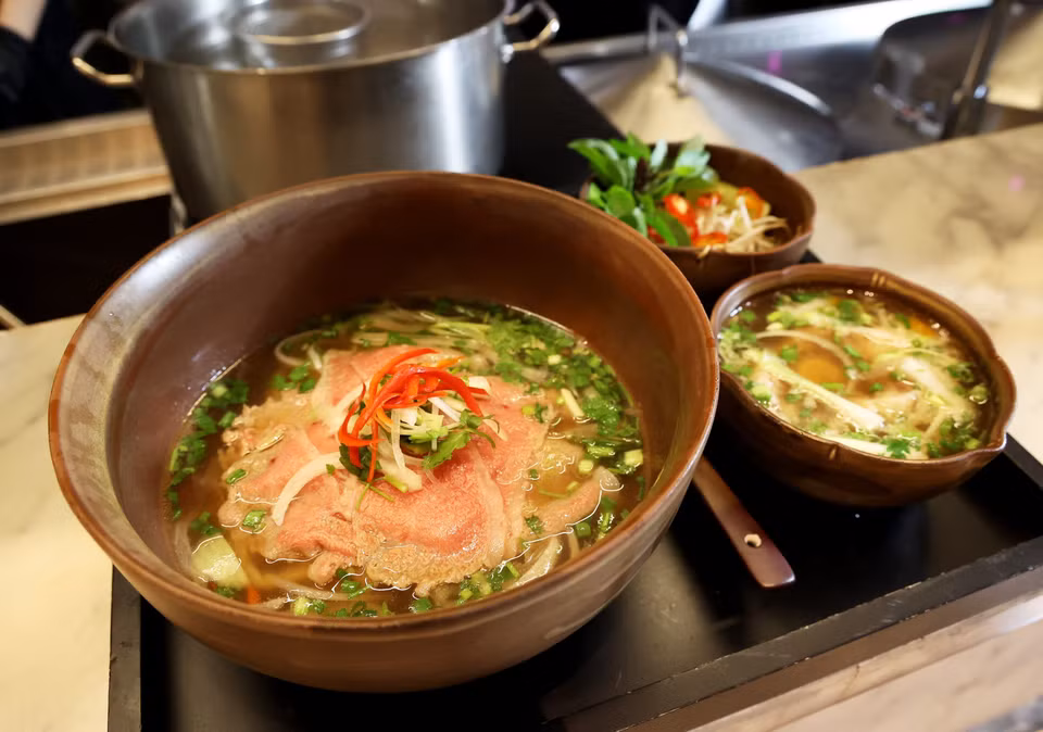 Pho Landmark81 serves with a poached egg yolk in a separate bowl. (Photo: VNA)