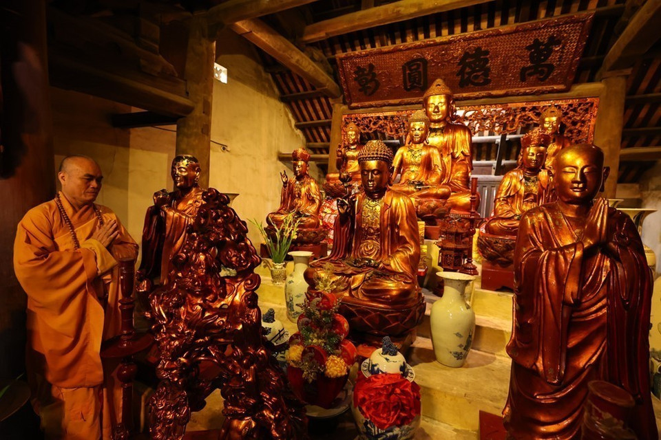 The Three Buddhas statue set at Con Son Pagoda, dating back to the Le Trung Hung (16th -18th century) Dynasty, is recognised as a national treasure. (Photo: VNA)