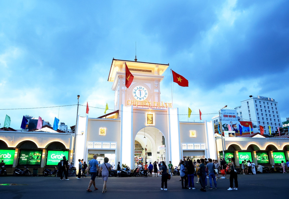 A symbol of Ho Chi Minh City tourism, Ben Thanh Market, is illuminated at night. (Photo: VNA)