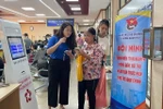 The Ho Chi Minh Communist Youth Union of Hanoi sets up 126 volunteer teams to support public service centres. (Photo: VNA)