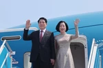 State President Luong Cuong and his spouse Nguyen Thi Minh Nguyet leave Hanoi on August 3 morning for state visits to Egypt and Angola. (Photo: VNA)