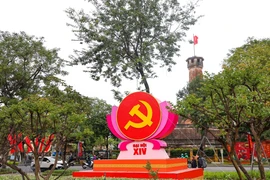 Hanoi adorned with flags and flowers to welcome 14th National Party Congress