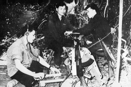 The Liberation News Agency’s telegraph team transmits reports from the frontlines to headquarters. (Photo: VNA)