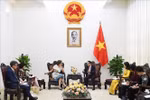 Deputy Prime Minister and Foreign Minister Bui Thanh Son (R) and UNESCO Director-General Audrey Azoulay in Hanoi (Photo: VNA)
