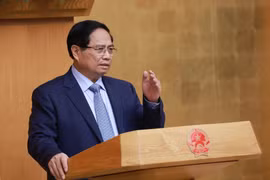 Prime Minister Pham Minh Chinh speaks at the Government's meeting on reviewing and removing bottlenecks for the implementation of the two-tier local government model on October 1. (Photo: VNA)