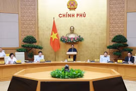 At the Government meeting on the implementation of the two-tier local government model in Hanoi on October 29 (Photo: VNA)