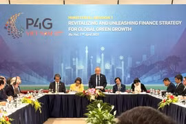 At the discussion on "Revitalising and Unleasing Finance Strategy for Global Green Growth". (Photo: VNA)