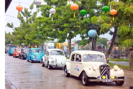 Parade of classic cars in Hoi An ancient town