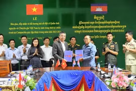 At the sigining ceremony on July 3 (Photo: VNA)