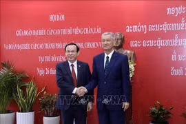 HCM City, Lao capital step up cooperation