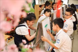 Hanoi to further boost investment in education, training