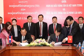 Heartfelt relations between news agencies of Vietnam, Laos