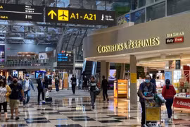 Singapore to scrap most COVID-19 restrictions from April 26