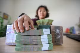 Reference exchange rate down 2 VND on August 31 