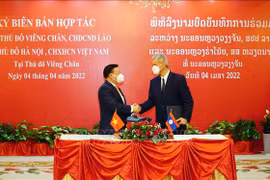 Hanoi, Vientiane enhance cooperation