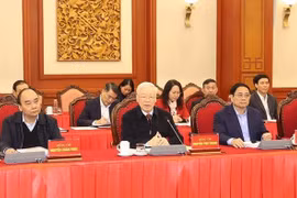 Politburo members discuss review of resolution on HCM City development