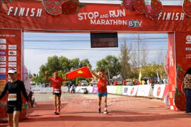 Athletes finish the 42km distance at the Stop And Run Marathon BTV Binh Thuan 2024. (Photo: VNA)
