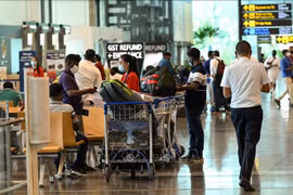 Singapore continues to reopen borders