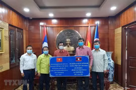 Lao provinces join hands with Vietnam to fight COVID-19