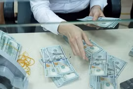 Reference exchange rate down 23 VND on June 9