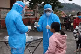 Vietnam reports 54 more COVID-19 infections, including one imported case