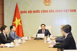 Top legislator holds phone talks with Lao counterpart