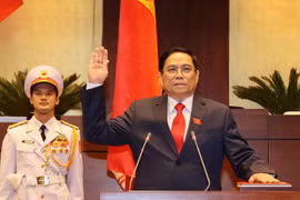 Prime Minister Pham Minh Chinh takes oath of office (Photo: VNA)