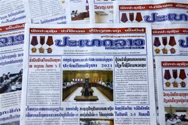 Lao newspaper hails Vietnam's achievements, Laos-Vietnam ties
