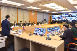 Vietnamese, Lao legislators exchange experience in law making