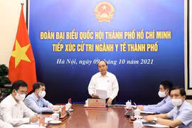 President urges HCM City to control risks following reopening measures
