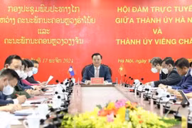 Hanoi, Vientiane promote ties in new period