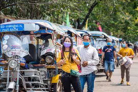Laos tightens border controls to prevent Omicron variant