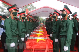 Remains of martyrs repatriated from Laos reburied in Nghe An, Thanh Hoa