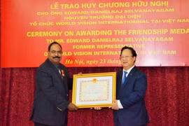 Former World Vision national director receives Friendship Medal