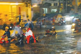 HCM City struggles to cope with record rainfall, floods