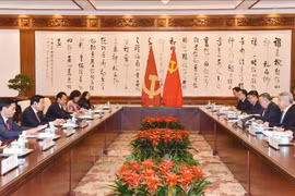 At the working session (Photo: qdnd.vn)