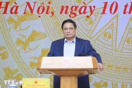 Prime Minister Pham Minh Chinh presides over the first meeting of the Central Steering Committee for for the eradication of the temporary and dilapidated houses. (Photo: VNA)