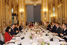 At the talks (Photo: VNA)