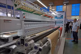 The expos cover over 6,000 sq.m, drawing over 210 exhibitors from 10 countries and territories. (Photo: VNA)