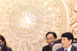 Politburo member and standing member of the Party Central Committee's Secretariat Luong Cuong (R) and Portuguese Communist Party General Secretary Paulo Raimundo at their meeting in Hanoi on August 16. (Photo: VNA)