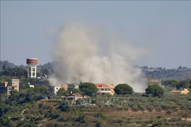 Israel carries out an airstrike on Tayr Harfa, southern Lebanon on July 12. (Photo: Xinhua/VNA)