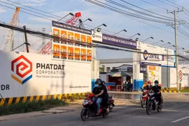 Volatile real estate market puts pressure on business results